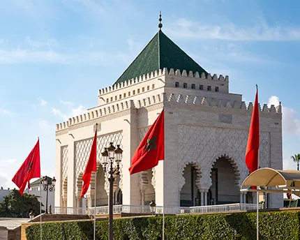 The white marble facade of the Mausoleum of Mohammed V, Rabat